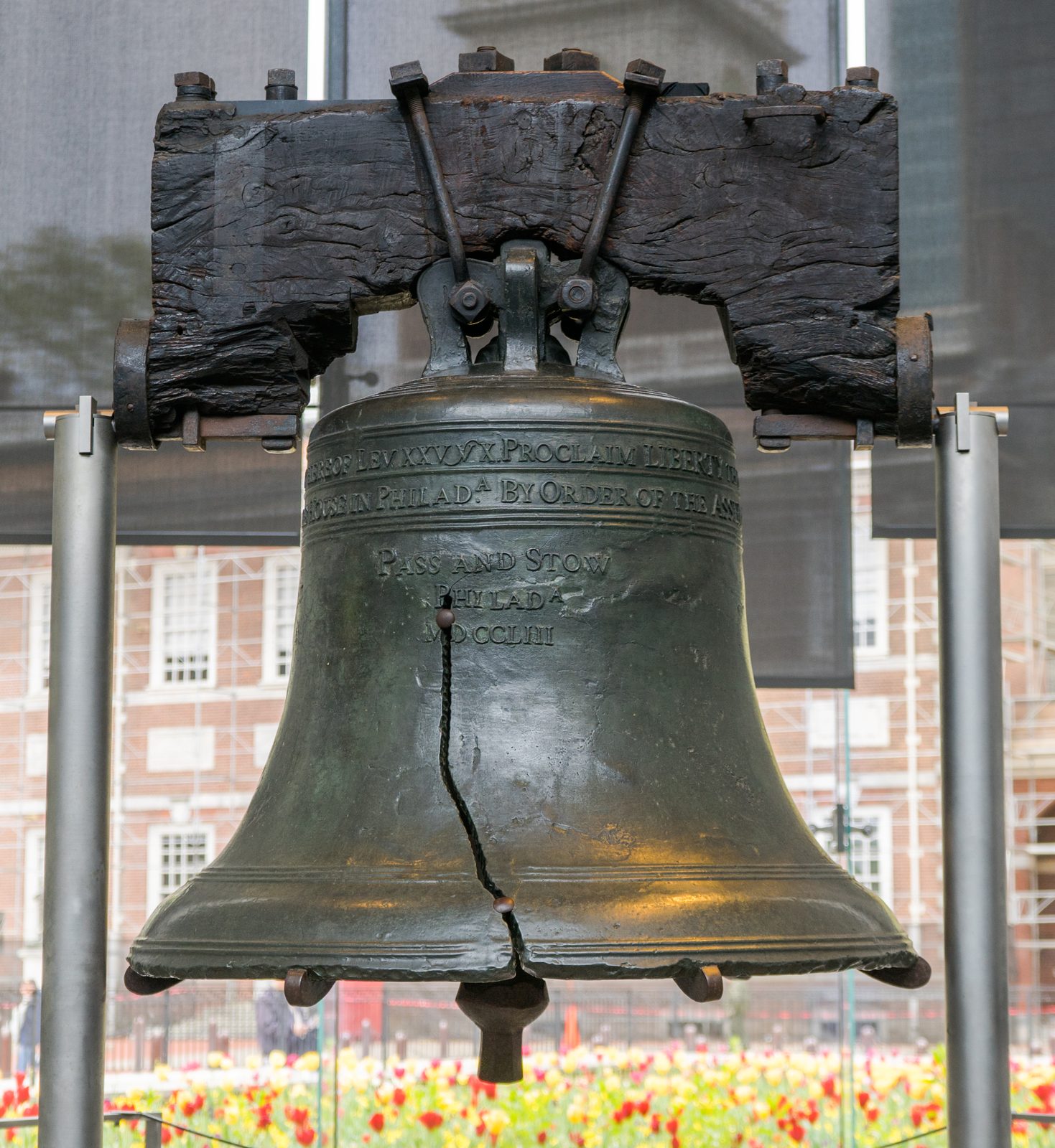 The irony made literal. The Liberty Bell carries the line from Leviticus 25, "proclaim liberty throughout all the land." The country that cast it now runs the global debt system. Source: Wikimedia Commons.